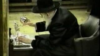 Bobov Rebbe Ztquotl on Chanika Lighting Menorah amp Playing Dreidel [upl. by Laiceps]